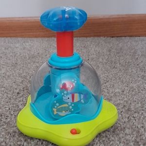 Press & Glow Spinner